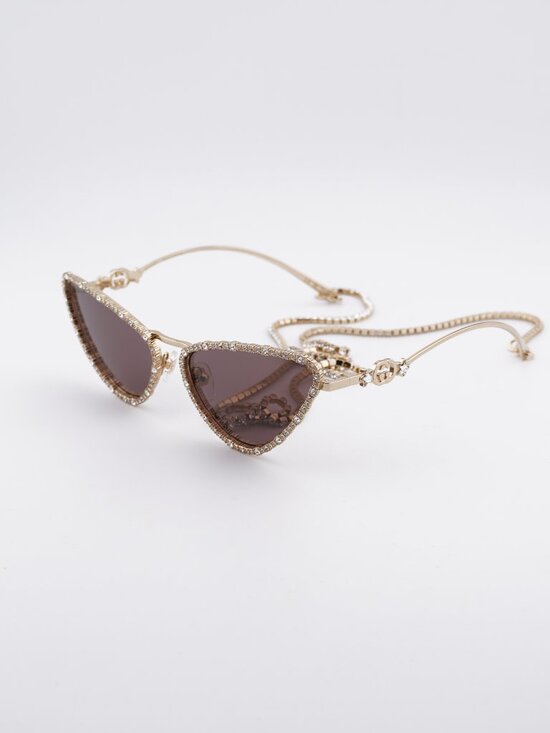 Gucci GG1569S 001 Sunglasses Gold with White Stone Cat Eye Frame, Brown Lenses